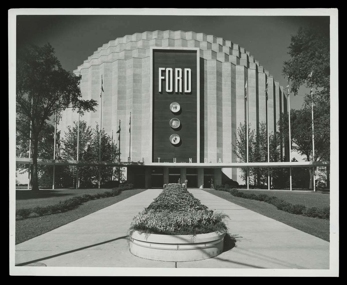 Ford Rotunda, 1953 Crenellated round building with tiered top with large "FORD" sign