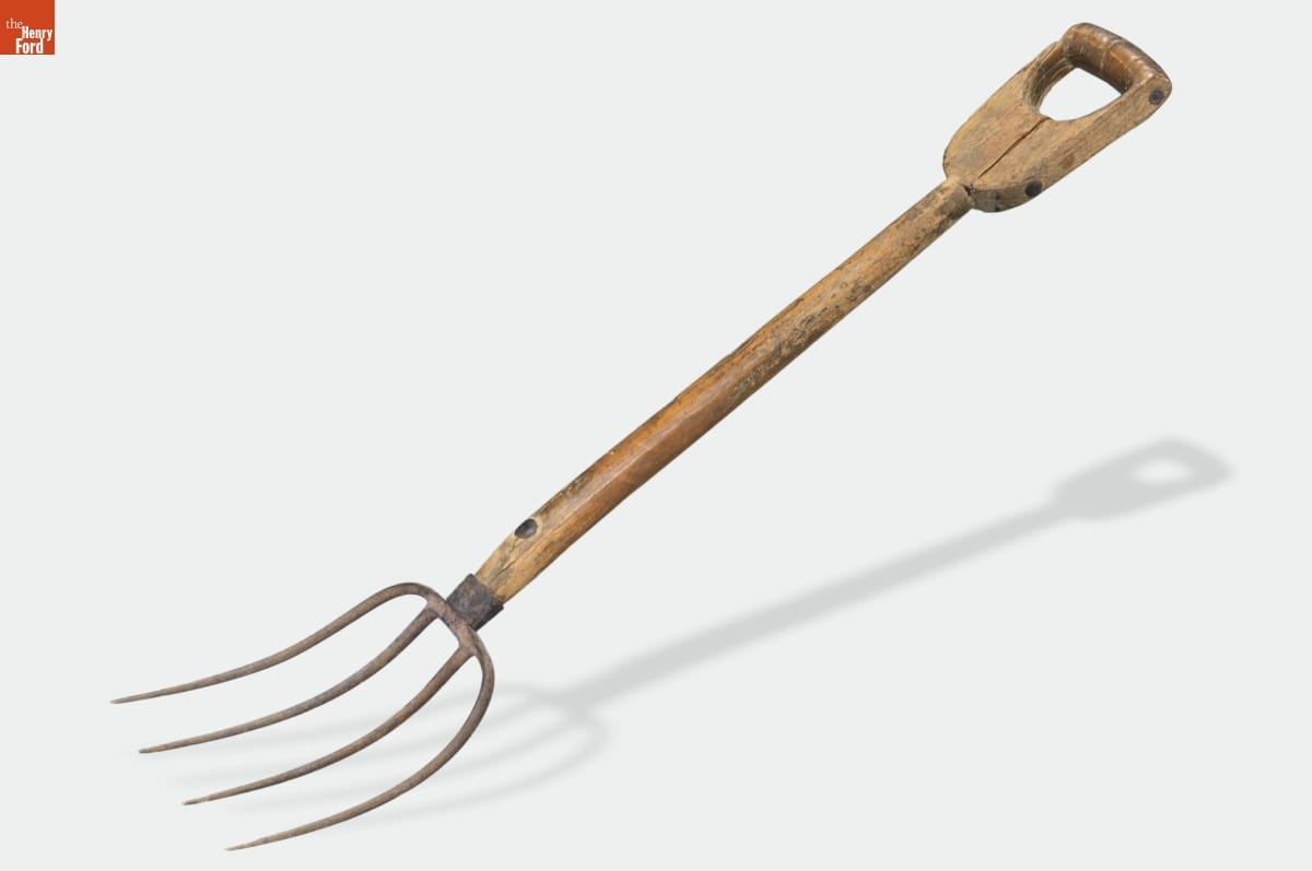 Manure Fork, 1875-1890 Wooden-handled pitchfork with four metal tines