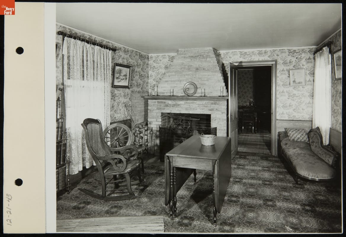 thf255616 Everyday parlor inside Ford Home, 1943. “Personal Memoirs of U.S. Grant” are visible on the book stand’s third shelf.