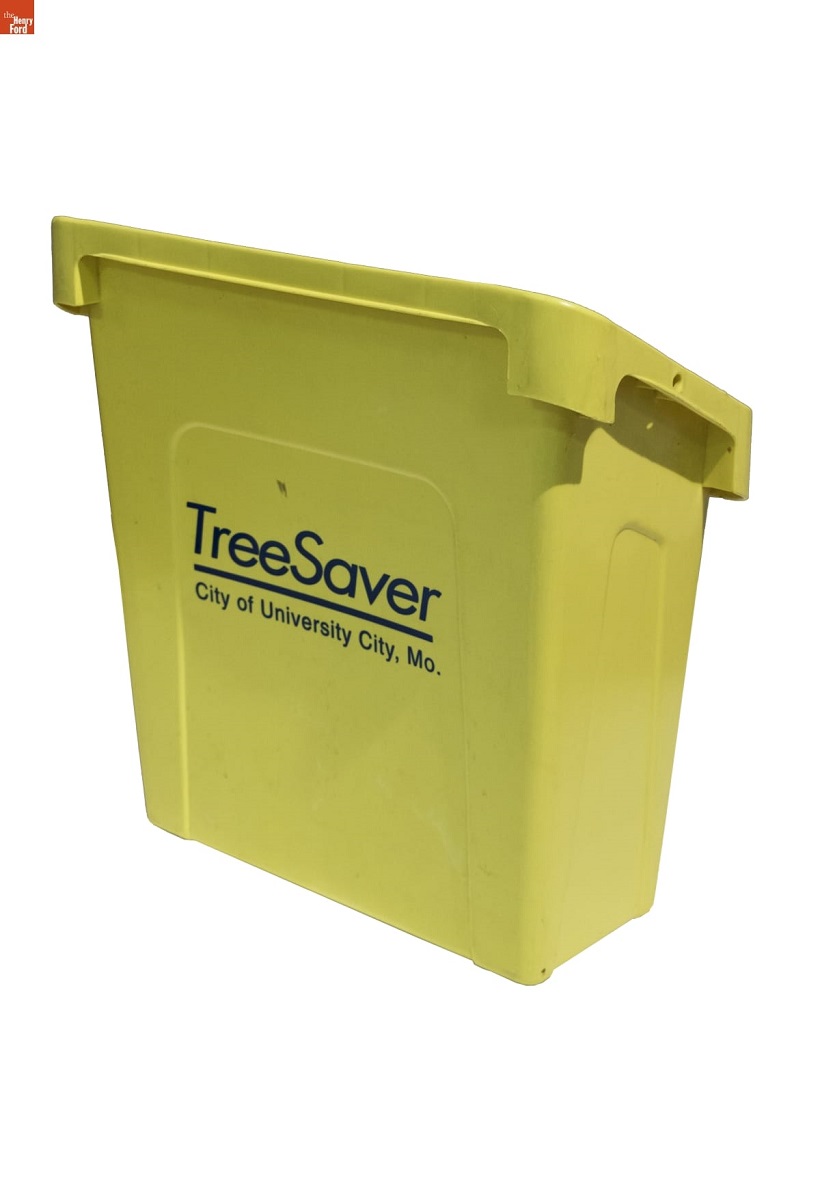Yellow bin with slanted top and blue text