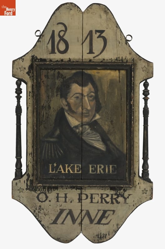 Wooden sign with image of man and text