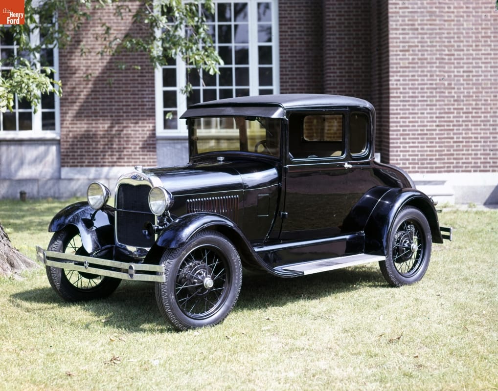 1929 Ford Model A Coupe, Used by Henry Ford Black car on grass in front of a brick wall with windows