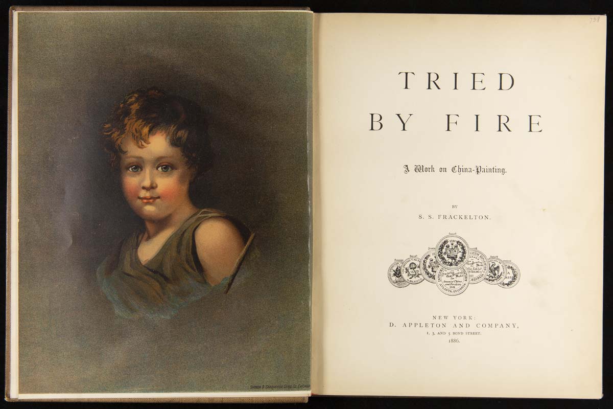 Book open to title page with text and frontispiece with painted portrait of a child