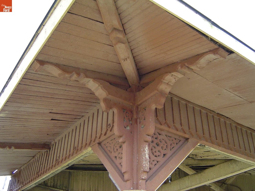 Detail looking up into corner of open building showing architectural details