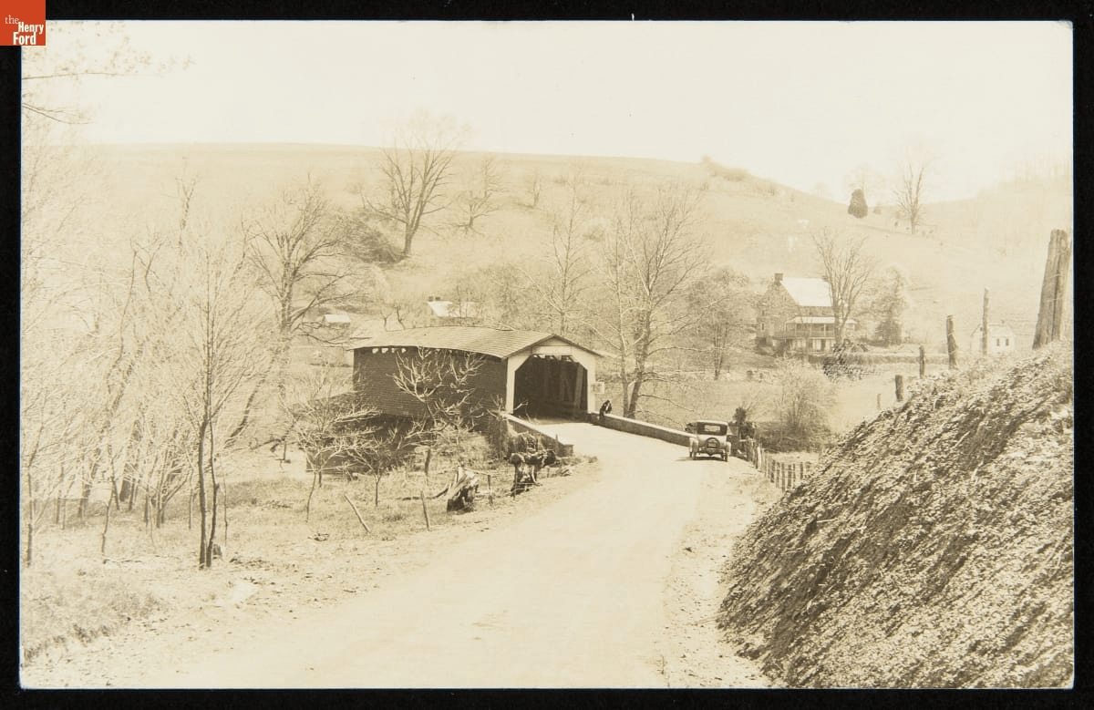 GIF cycling through four postcards showing covered bridges