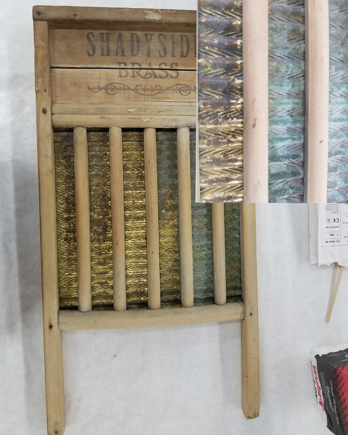 Brass washboard pre cleaning showing verdigris