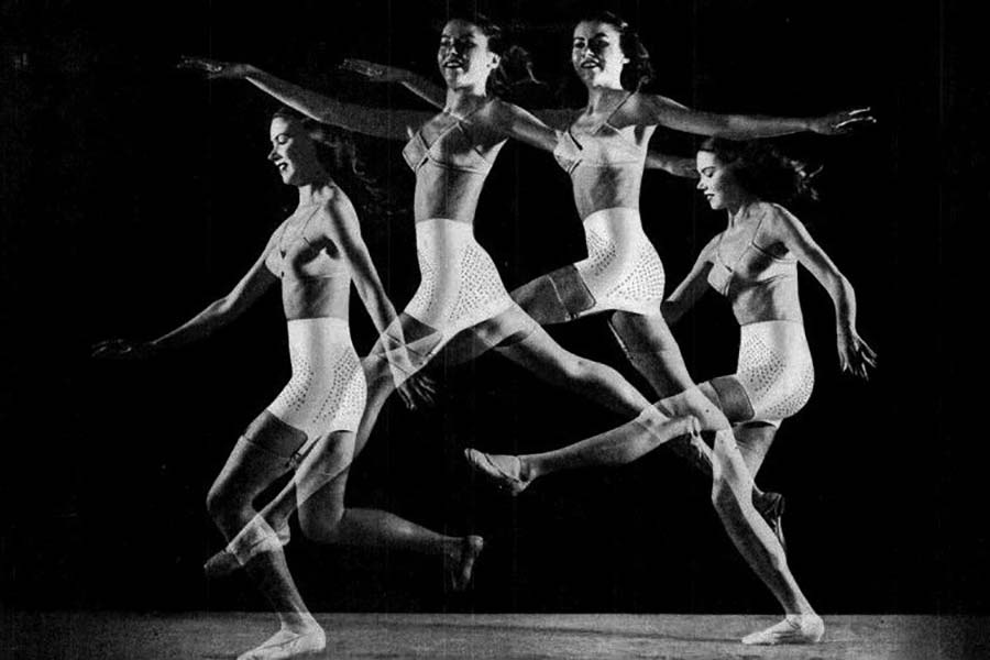 Composite black-and-white image of a woman in bra and girdle leaping through four positions
