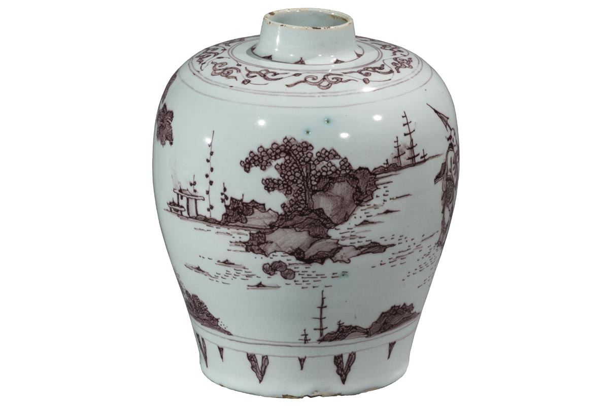 White jar with medium base tapering out to wider near top with a narrow mouth; decorated in brown with water, cliffs, trees, buildings, ships