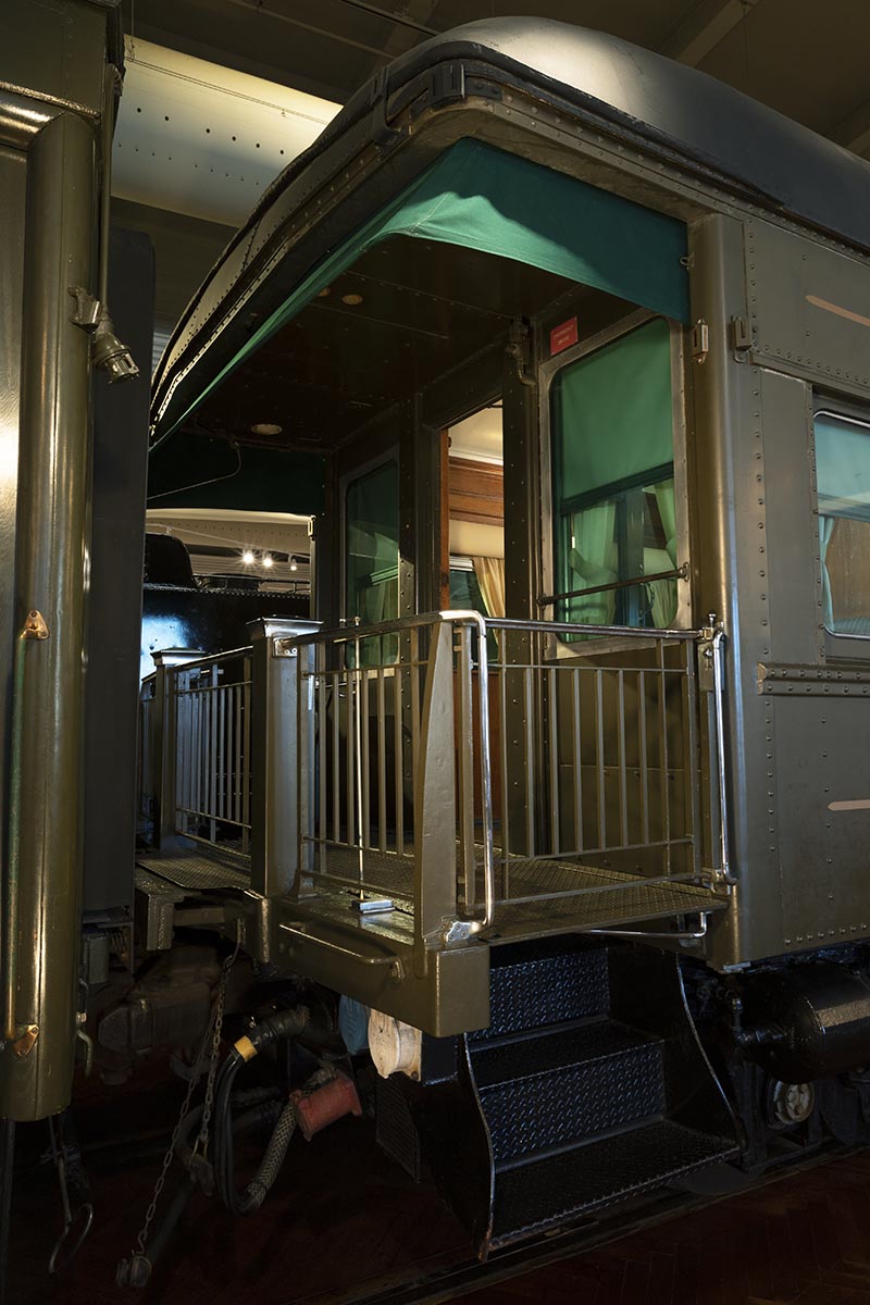 Back platform of rail car in large room