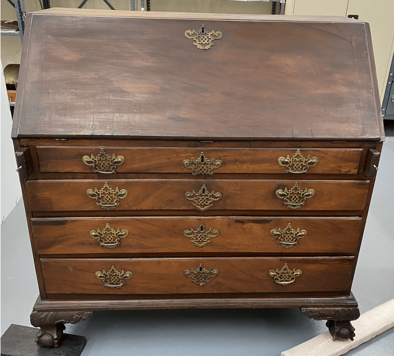 View of the desk before conservation.