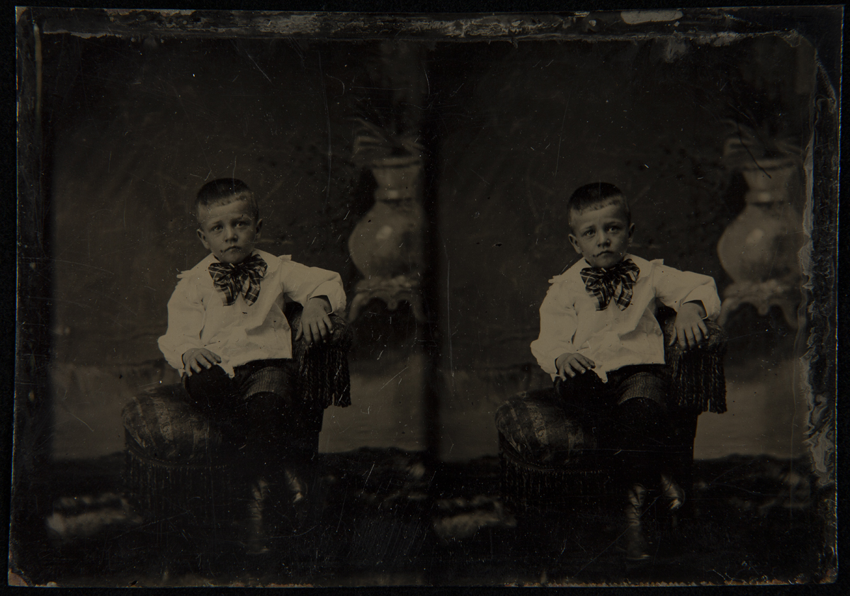 Two images of seated boy wearing white shirt and plaid bow at neck
