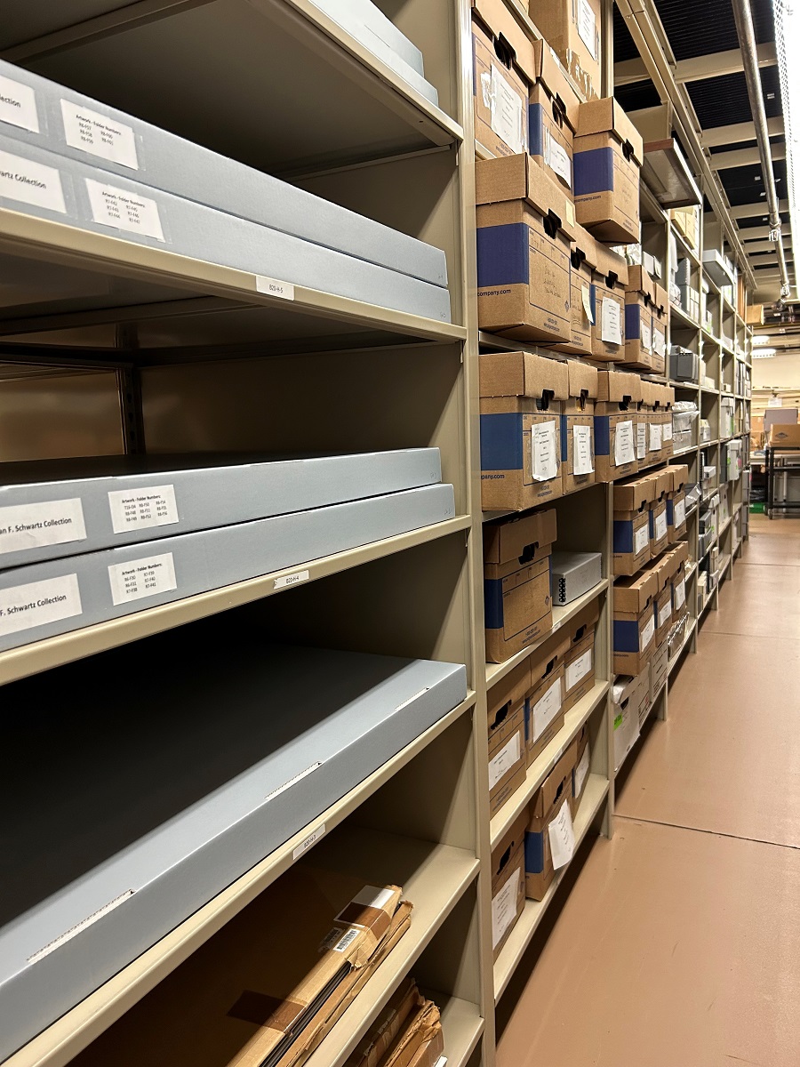 Shelves stretching into the distance filled with a variety of archival boxes