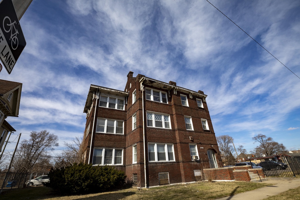 Three-story red brick building