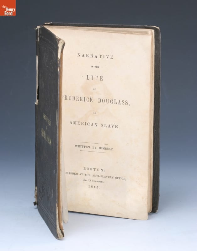 "Narrative of the Life of Frederick Douglass," 1845 Book standing on end, open to title page, which contains text