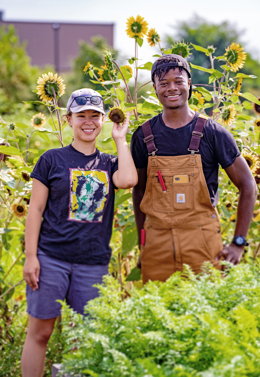 Lola Gibson-Berg and Akello Karamoko at Keep Growing Detroit's farm in the Eastern Market district