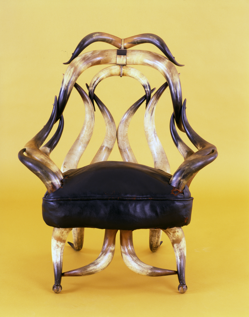 Armchair Made of Steer Horns, 1885-1905 Chair with black leather seat cushion and back, arms, and legs made out of steer horns
