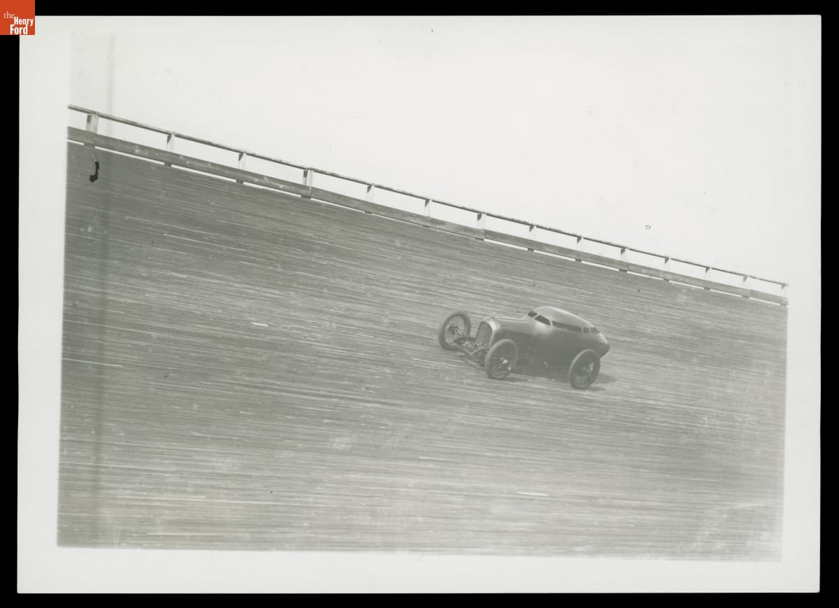 Race car on steeply tilted wood track