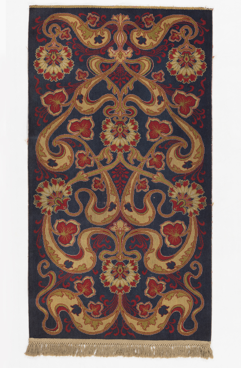 Black, red, and beige floral-patterned rug