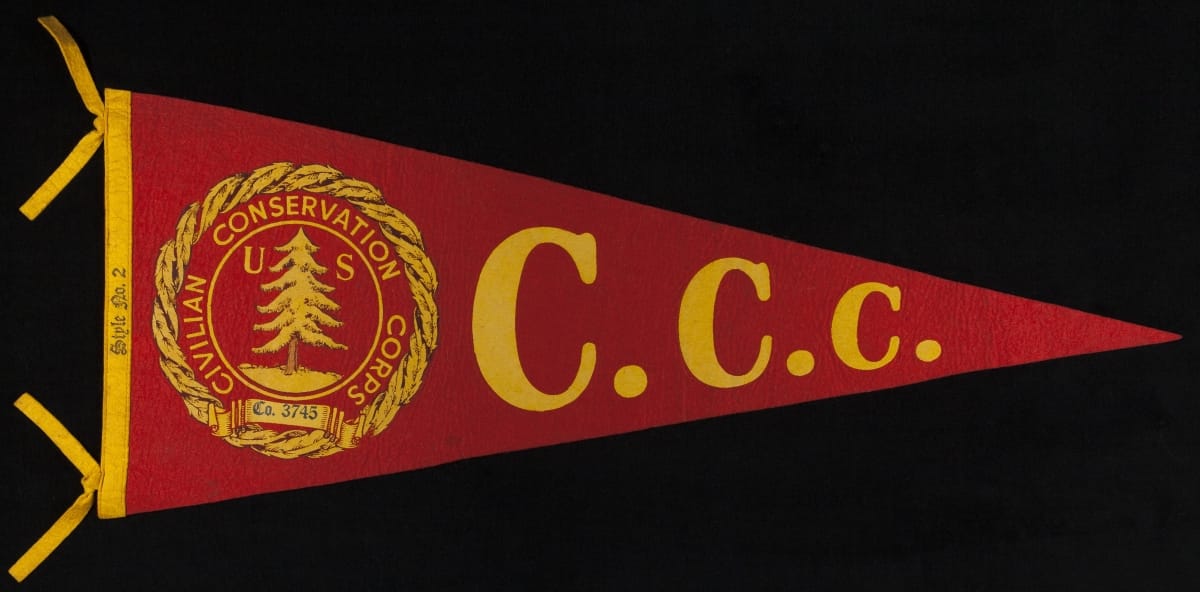 Red pennant with text "C.C.C." and golden seal with text and tree