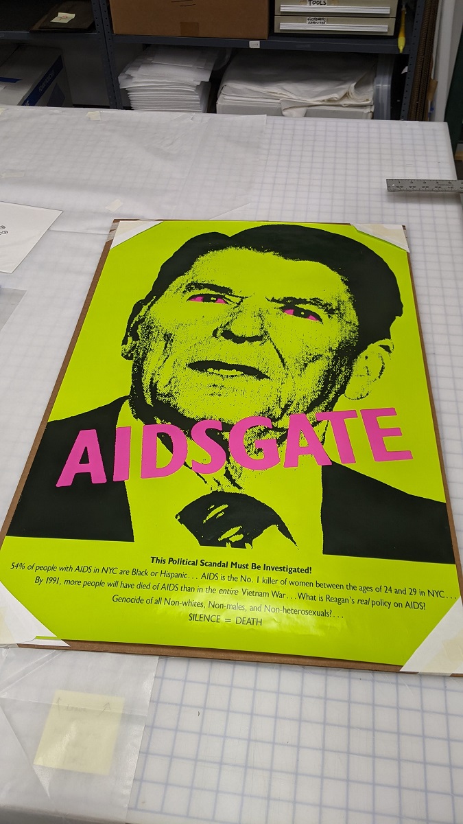 “AIDSGATE” Poster, 1987 Acid yellow/lime green poster with image of Ronald Reagan's face and text
