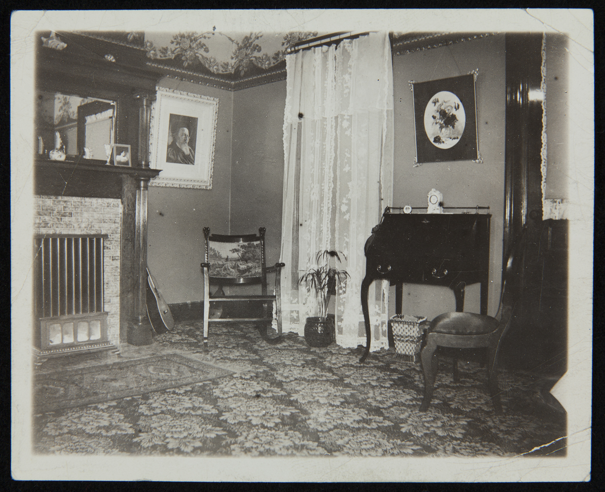 Front Room in Wright Home at Its Original Site, Dayton, Ohio, about 1897-1898 Room with chairs, window, desk, elaborate fireplace