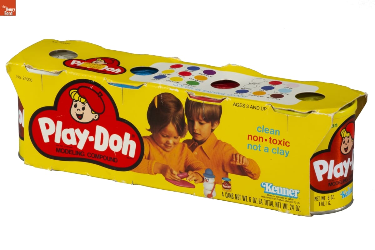 Yellow packaging with text and photo of two children playing