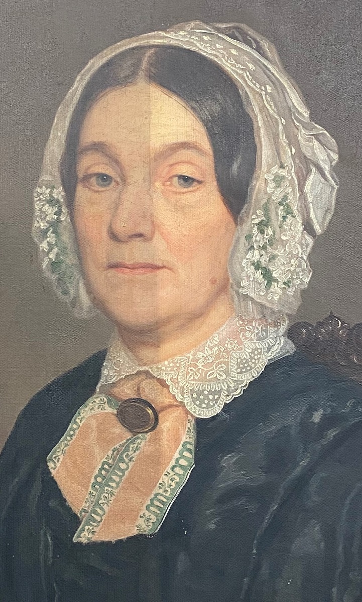 Detail of woman in black dress and white lace collar and bonnet; right half is lighter and brighter than left half