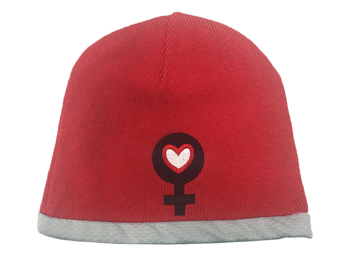 Red beanie with symbol for female with a heart inside it on the front
