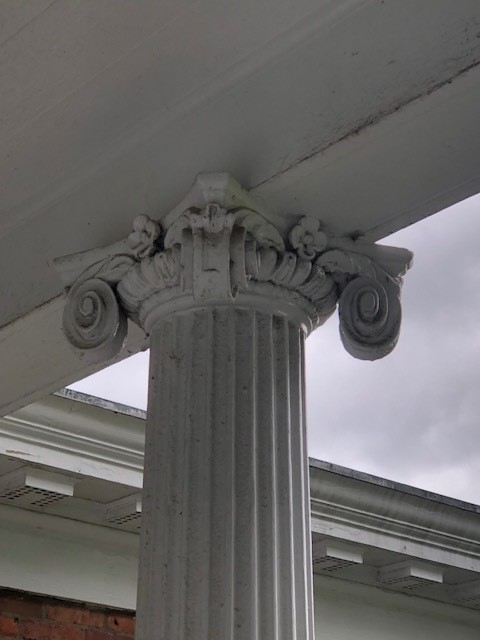 Cornice of white column from underneath