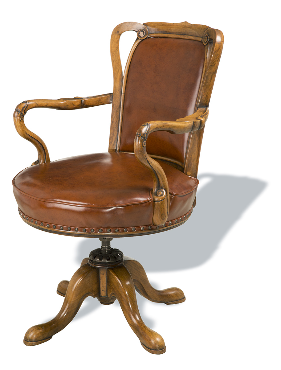 Brown leather office chair with wooden base, arms, and back edging