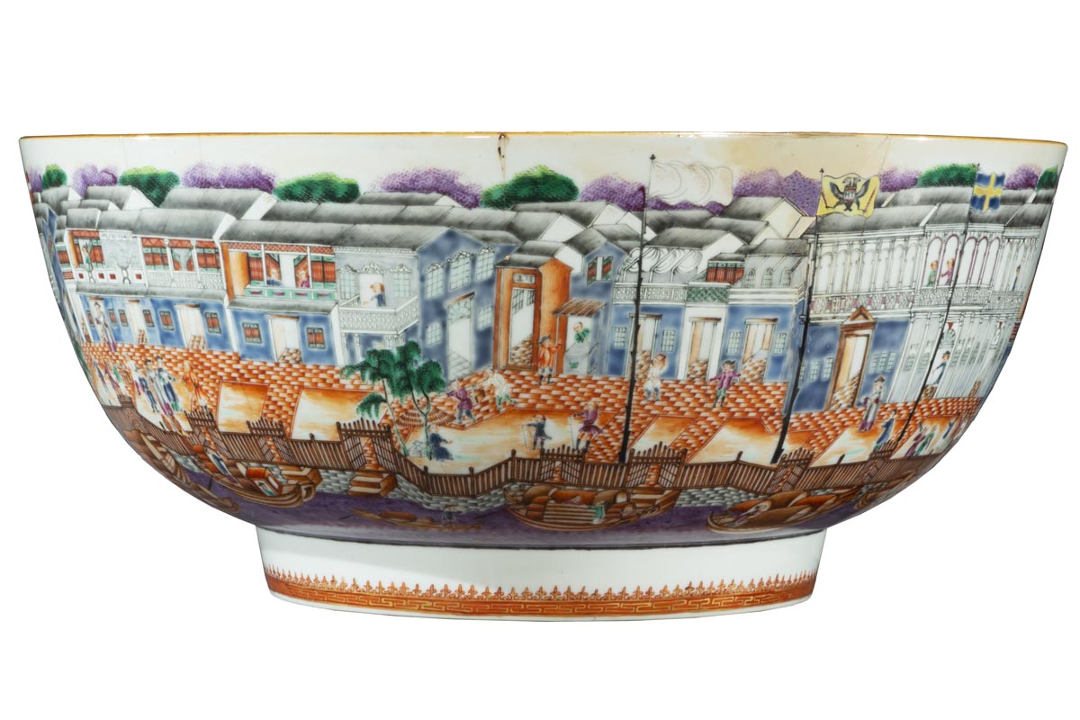 Short-ish bowl with wide base and even wider sides, decorated with a wharfside scene of buildings, people, docks, boats, and water