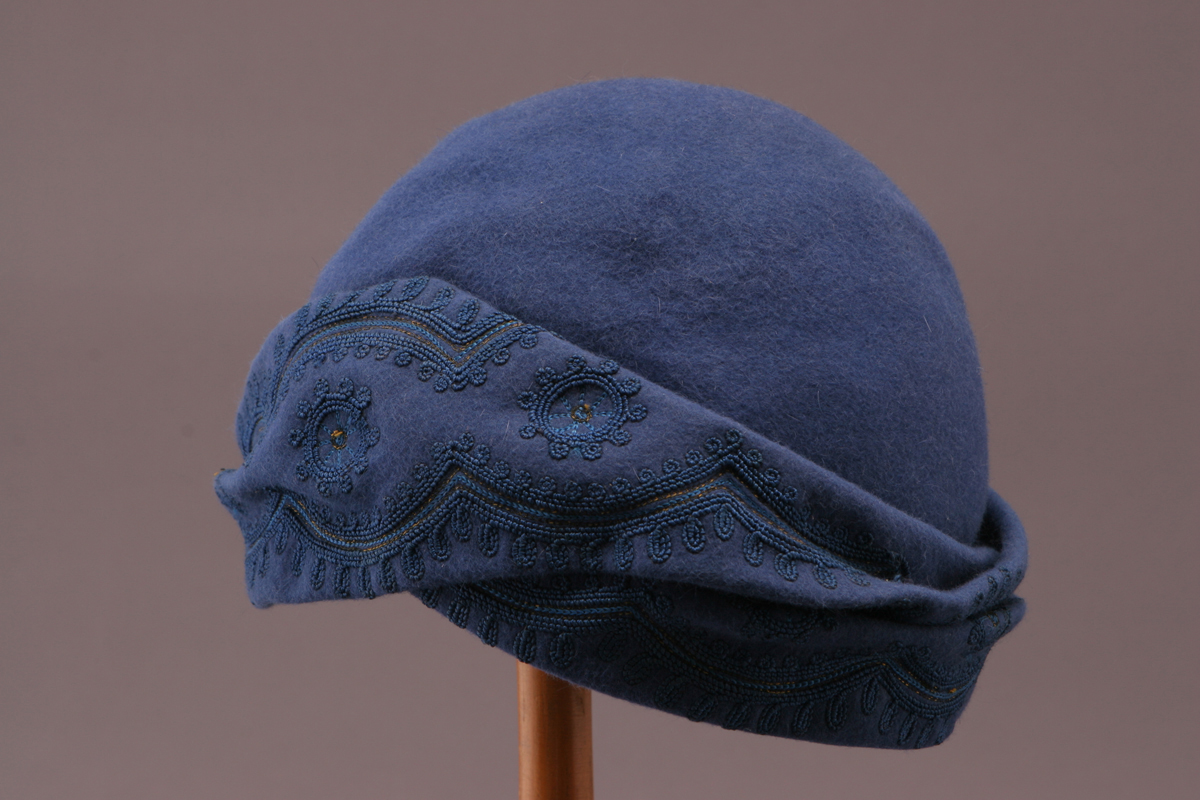 Blue cap with embroidered detailing