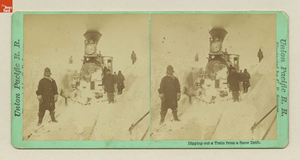 Double image of a train on a track surrounded by snow with a number of people nearby