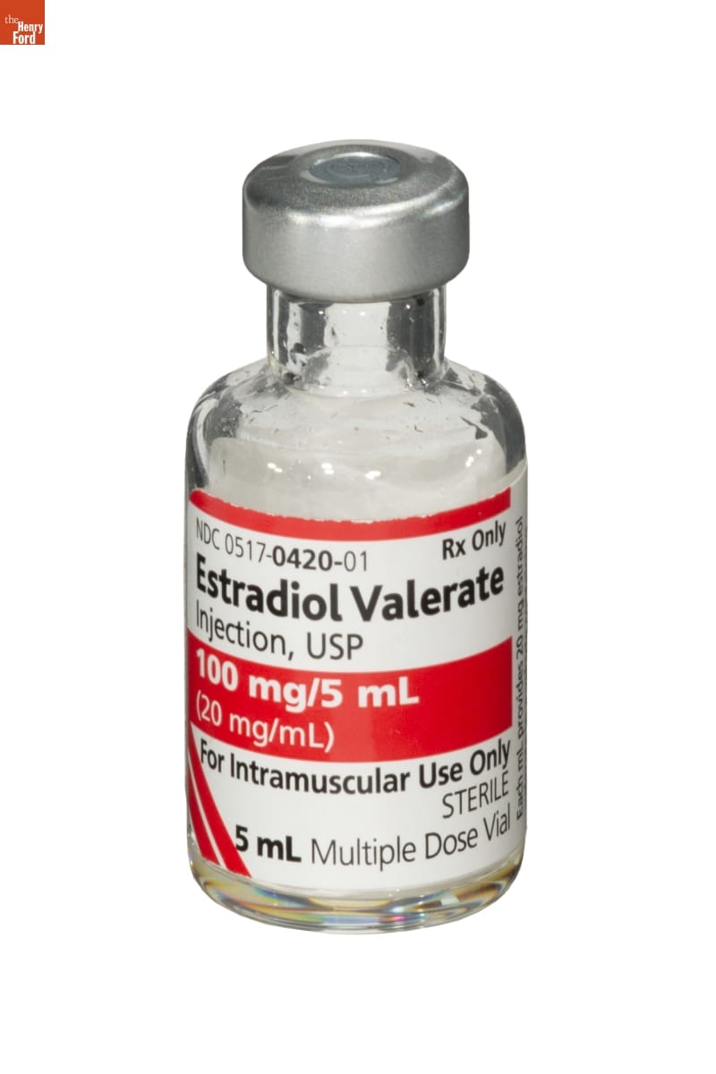 Estradiol Valerate 100mg/5mL Vial, 2020 Small glass prescription bottle with silver cap and white and red label containing text