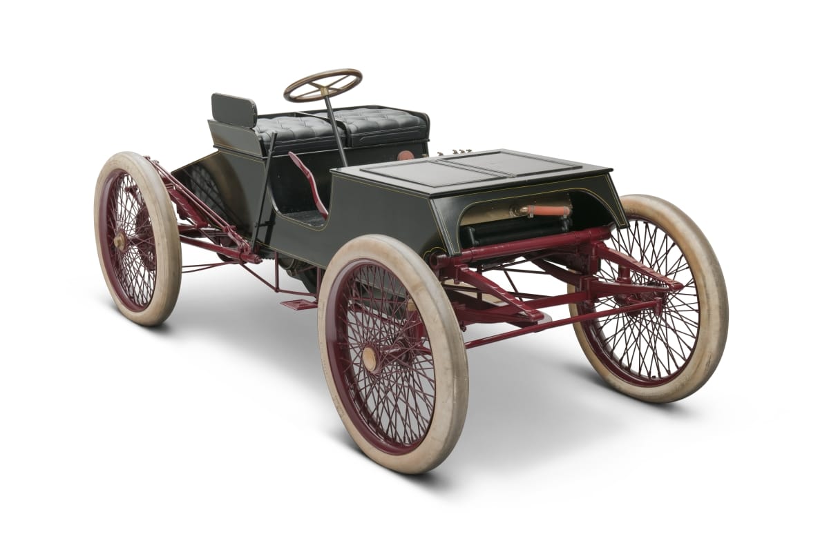 1901 Ford Early open car with four large white wheels